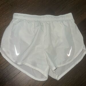 White Nike shorts